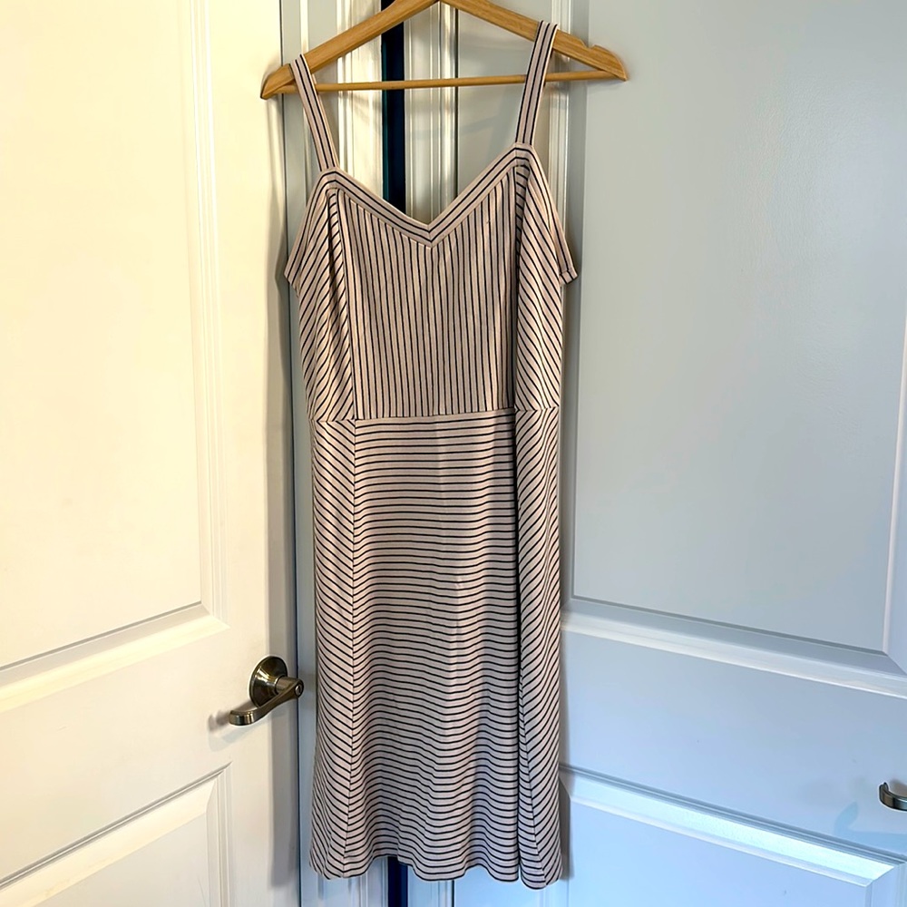 Black & off white striped dress. Back zipper. Overall length 41”& 23” from band